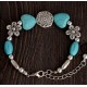 Turquoise and Tibetan silver bracelet with simbolic pendants