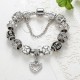 Tibetan Silver y Crystal Heart Charm Bracelet