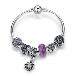 Pulsera rígida con charms cristales color violeta y colgante flor