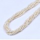 Conjunto de collar y pulsera multicapas elaborados con perlas auténticas en color crudo
