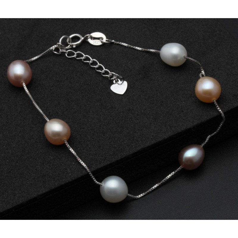 Adjustable Pearl bangles in white oval pearls and kundans