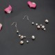 Pendientes de perlas naturales con efecto flotante
