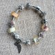Pulsera con charms cristal rosa y blanco y colgante con ala y corazon